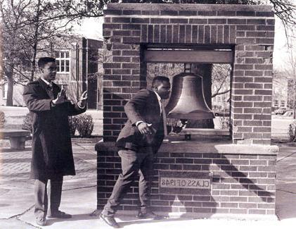 Students ring the Bell of '48 to celebrate the campus's first celebration of contributions and achievements made by black men and women to the university and the nation.  The event was called Black Week.